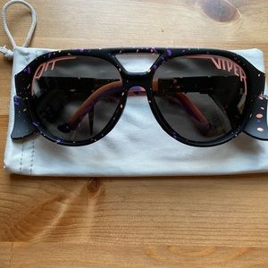 Pit Viper sunglasses. Polarized, black with lavender and coral splatter.